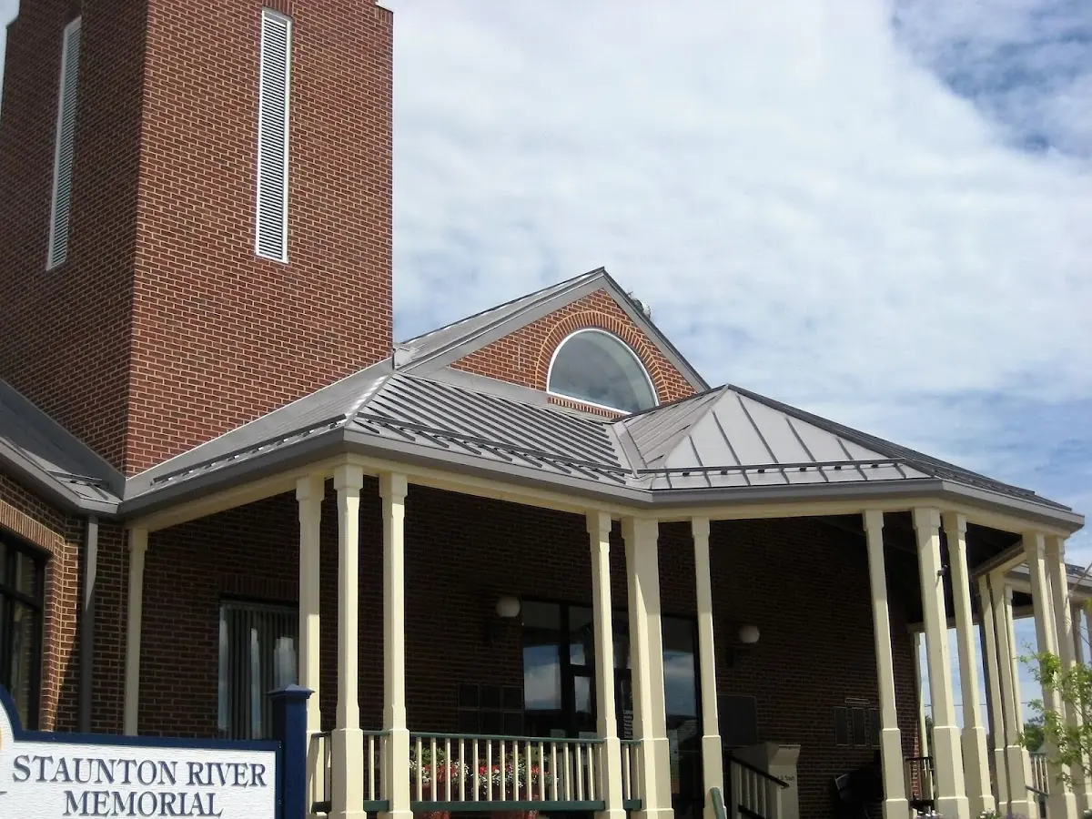 Skilled roofing craftsmen working on a residential roof in Lexington